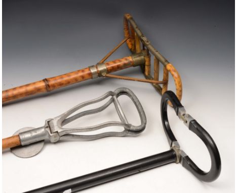 A BAMBOO AND METAL MOUNTED FOLDING SHOOTING STICK, stamped, another, ebonised, patent pending and another by Swaine & Adeney 