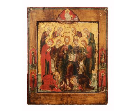 AN ORTHODOX ICON portraying the Extended Deesis with the kneeling figures of Ss Zossima and Savaati, with a further depiction