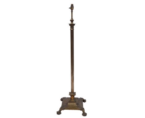 A BRASS CORINTHIAN COLUMN STANDARD LAMP on a square stepped base with claw feet, approximately 130cm high