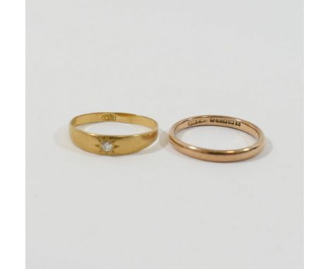 A 9 carat gold wedding band, Birmingham 1922, finger size P, 2.2g, and a diamond set gypsy ring, the old-cut stone approximat