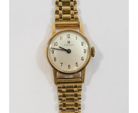 A ladies 9 carat gold Tissot bracelet watch, the case London 1963, the watch with circular face, Arabic numerals, and 17 jewe