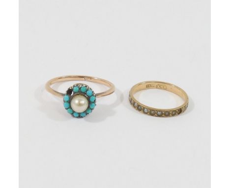 A turquoise and seed pearl circular cluster ring, stamped '9CT', finger size N, 2.4g gross (one stone lacking), a Victorian t