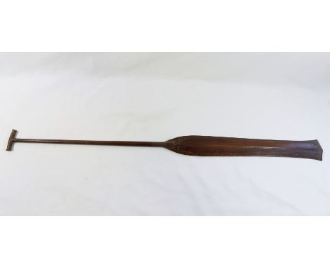 A ceremonial carved wooden Dayak canoe paddle from Borneo, Indonesia, 80.5cm longCONDITION REPORTS &amp; PAYMENT DETAILSIMPOR