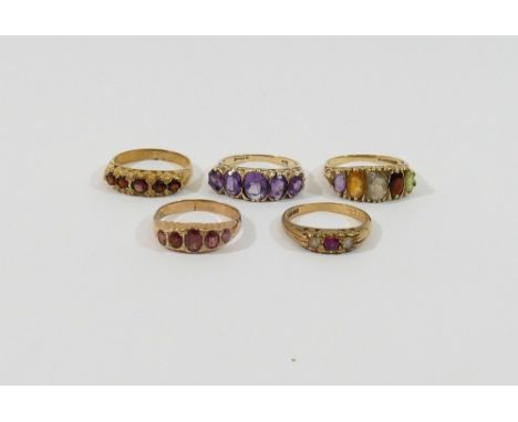 Five 9 carat gold gem-set rings, including three five-stone carved half hoop rings, a smaller five stone ring and a three sto