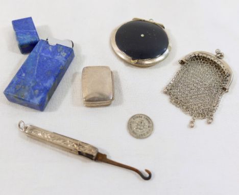 A small chainmail purse stamped 'SILVER', a folding button hook with silver handle, a circular powder compact, a small rectan