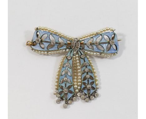 A French Belle Epoch enamel, seed pearl and diamond set bow brooch, the pale blue guilloche enamel with foliate pierced desig