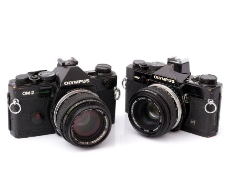 An Olympus OM-2 MD SLR Camera, black, with Zuiko f/1.8 50mm lens, together with OM-2 Spot/Program, black, with Zuiko f/1.4 50