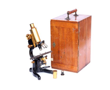 Monocular Brass & Black Enamel Microscope, engraved 'Service, Watson & Sons Ltd', with single eyepiece and 3 objectives, rack