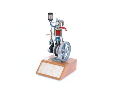 A Cut-Away 4-stroke Diesel Engine Demonstration Model, hand-cranked flywheel with moving piston, crankshaft, inlet and outlet
