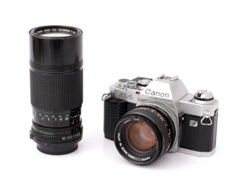 A Canon AL-1 QF SLR Camera, with S.S.C. f/1.4 50mm lens, together with Canon FD f/4.5 70-150mm lens (a lot)