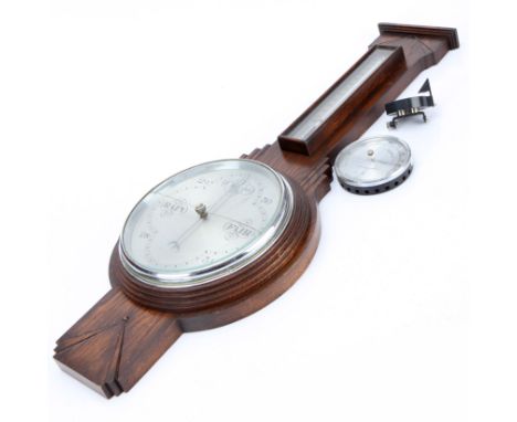 An Aneroid Barometer, stained and polished oak with thermometer, with all nickel fittings, glass to face cracked, 76cm tall