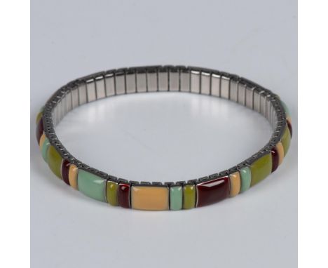 Beautiful expansion band bracelet decorated with colorful enamel work. It measures approximately 8"L around the outside, but 