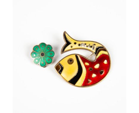 The beautiful fish pin is made from colorfully enameled sterling silver and measures 1.75"L x 1.75"W. The green flower is a s