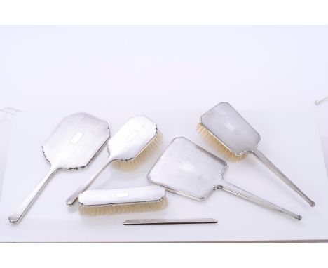 Selection of contemporary silver mounted dressing table items, including hand mirror and hairbrush with engine-turned decorat