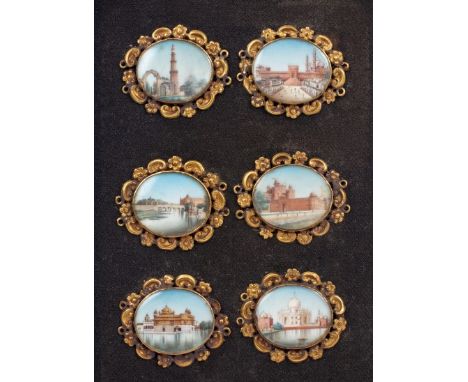 Set of six 19th century Indian miniature paintings on ivory, each of oval form, within gilt metal C-scroll and flower-head fr