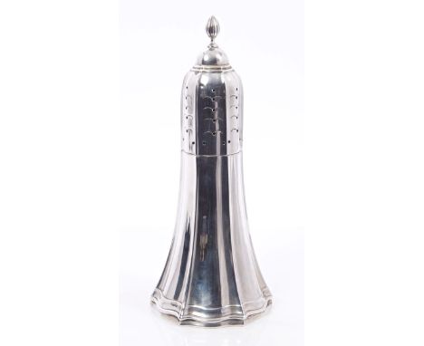 Early George V silver sugar caster of tall conical form, with fluted decoration, pierced fluted cover with flame finial (Shef