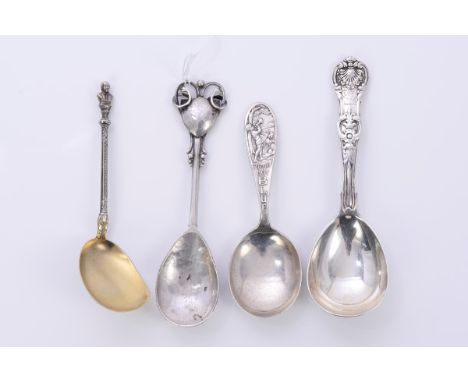 William IV silver Queens pattern caddy spoon with teardrop bowl and engraved armorial crest (London 1836) and an Edwardian Ar