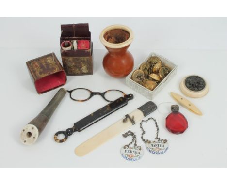 Collection of vertu items, to include silver mounted ivory page-turner, silver-capped ruby glass perfume bottle, horn cheroot