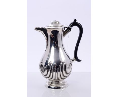 Victorian silver coffee pot or hot water jug of baluster form, with half-fluted decoration, ebony scroll handle and domed hin