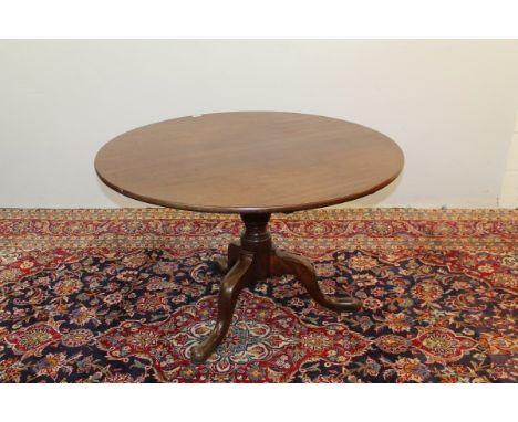 Large George III mahogany tripod table, the circular tilt top raised on vase-turned column and cabriole legs, 110cm diameter