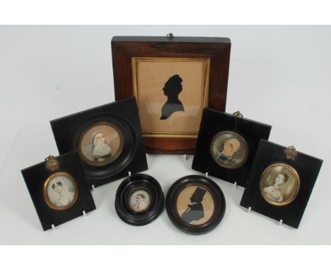 Edwardian oval portrait miniature on ivory, three other portrait miniatures on ivory, circular watercolour portrait and two s