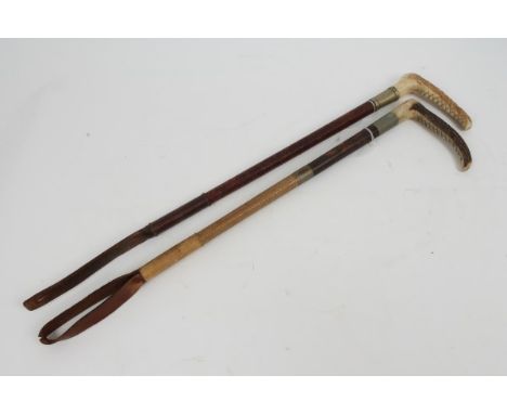 Swaine & Adeney leather covered hunting whip and another similar, both with stag horn handles