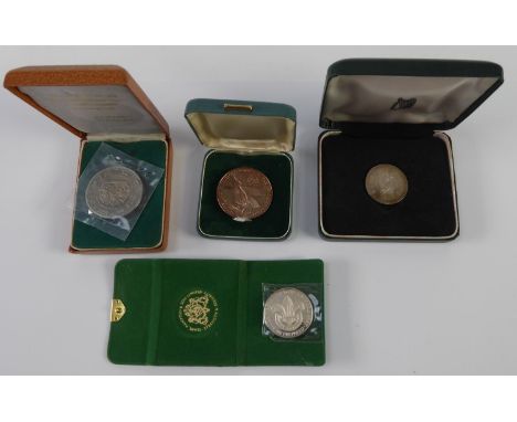 FOUR SILVER COMMEMORATIVE MEDALLIONS, VARIOUS NOTEWORTHIES, including Baden-Powell v1857 - 1941 and the Dalai Lama, each in c