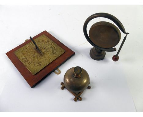 OLD BRASS COUNTER BELL; a small metal GONG and BEATER, 7" (17.7cm) high and a metal square SUNDIAL mounted on a wooden panel 