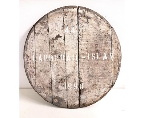 SCOTCH WHISKY BARREL TOPcream painted and stenciled '44 Laphroaig-Islay 1990', 59.5cm diameter 