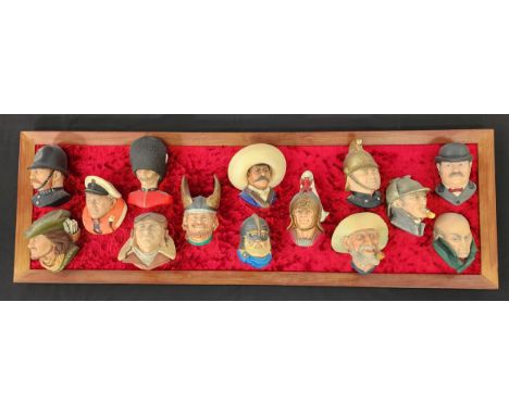 FOURTEEN BOSSON PLASTER HEADScomprising Sherlock Homes, Dr. Watson, Moriarty, Old Timer, Victorian fireman, Sir Lancelot, Ola