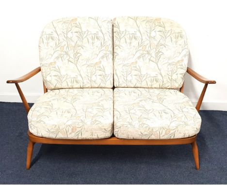 ERCOL WINDSOR SOFAthe arched stick back with loose seat and back cushions, 132cm wide 