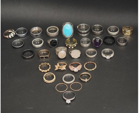 SELECTION OF SILVER AND OTHER RINGSincluding a diamond set silver band, stone and enamel decorated examples, etc. 