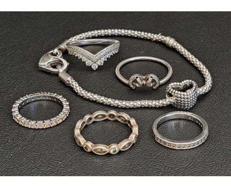 SELECTION OF PANDORA SILVER JEWELLERYcomprising a Moments Studded Chain bracelet with pierced heart clasp and heart charm, an