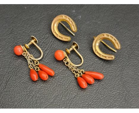 PAIR OF UNMARKED GOLD HORSESHOE EARRINGSand a pair of coral drop earrings in silver gilt 