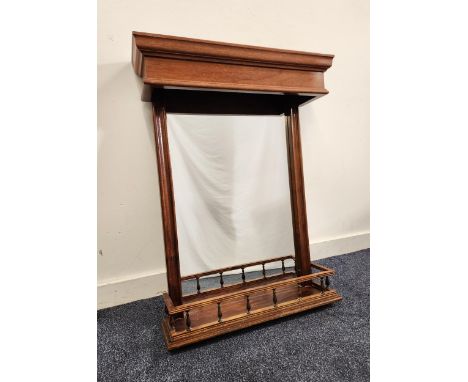 MAHOGANY WALL MIRRORwith a rectangular hood above a plain rectangular plate with a galleried shelf below, 86cm x 65.5cm 