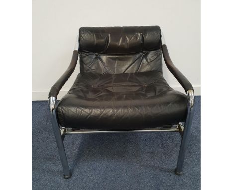 TIM BATES FOR PIEFF ARMCHAIRwith a chrome tubular frame and a black leather button back and seat cushion 