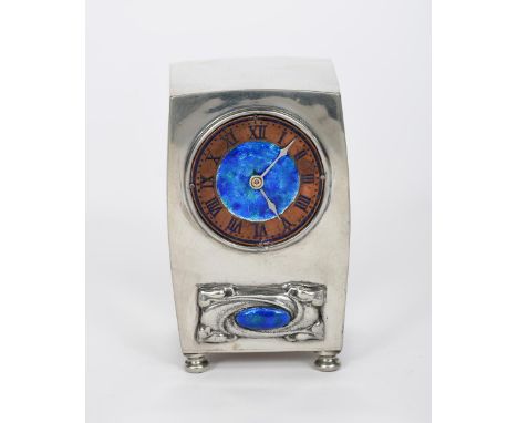 A Liberty &amp; Co Tudric Pewter and enamel clock, model no. 0756, swollen rectangular form, with cast foliage panel set with