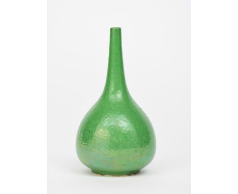 A Ruskin Pottery stoneware solifleur vase by William Howson Taylor, covered in an apple green lustre glaze impressed marks, 1