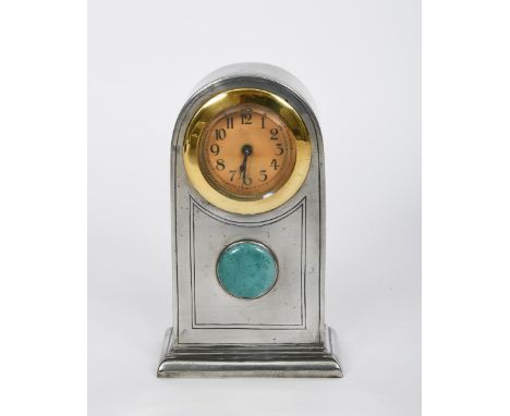 A Liberty &amp; Co English Pewter mantel clock, model no.01153, domed rectangular section with applied turquoise blue roundel