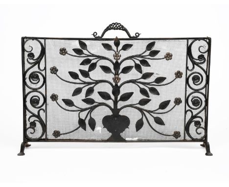 A wrought-iron firescreen,  rectangular, the central field a vase of scrolling flower stems, inside rectangular frame with sc