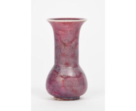 A Ruskin Pottery miniature vase by William Howson Taylor, dated 1922,  ovoid body with cylindrical neck and everted top rim, 