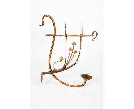 A patinated metal wall light designed by Mackay Hugh Baillie Scott, made for Glencrutchery House, Douglas, Isle of Man in 189