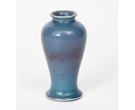 A Ruskin Pottery stoneware vase by William Howson Taylor, dated 1905, baluster form, covered in a lavender over pink souffle 