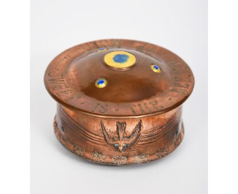 A Glasgow School copper and enamel jewellery box and cover, circular section on three cube feet, decorated with a frieze of s