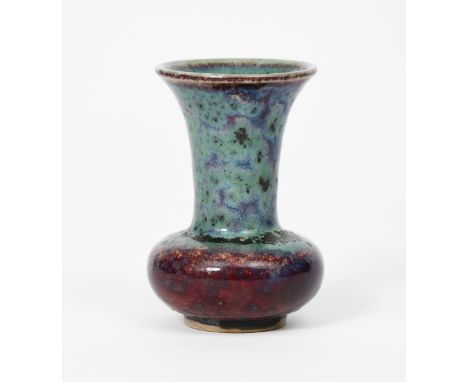 A Ruskin Pottery stoneware miniature vase by William Howson Taylor, dated 1909,  ovoid with flaring cylindrical neck, covered