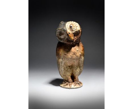 The Wise Owl  a fine Martin Brothers stoneware bird jar and cover by Robert Wallace Martin, dated 1884,  modelled with claw f