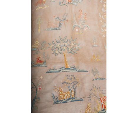 A pair of Cotswold School silk embroidered curtains,  each cotton, embroidered with panels of figures, trees, deer and birds,