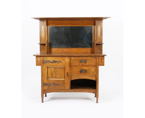 A Liberty &amp; Co. oak sideboard/buffet designed by Harris Lebus,  rectangular top with mirror back, the overlapping top wit