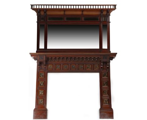 A mahogany fireplace and overmantel in the manner of Bruce Talbert,  the fireplace panelled with carved and gilded foliate pa