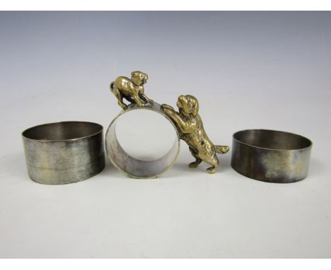 Two George VI silver napkin rings, Sheffield, 1943 and Sheffield 1947, 45g total weight, together with a novelty electroplate